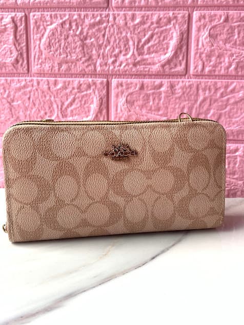 Monedero coach 